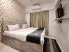 Bedroom three of TrustedStay Aleta Residency Service Apartment in Powai, Mumbai